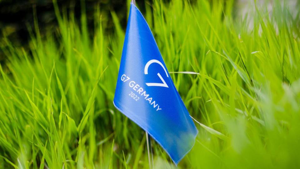 G7 flag in thr gras