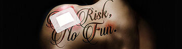 Schulter mit Tattoo: No risk, no fun.