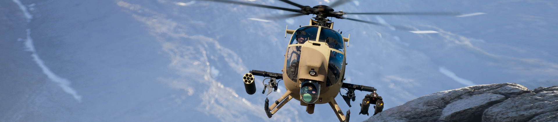 AH-6 front view with hills in the background