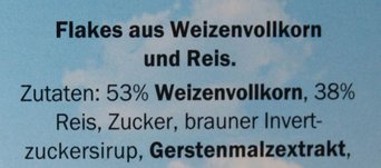 Produktkennzeichung mit dem folgenden Text "Flakes aus Weizen und Reis"