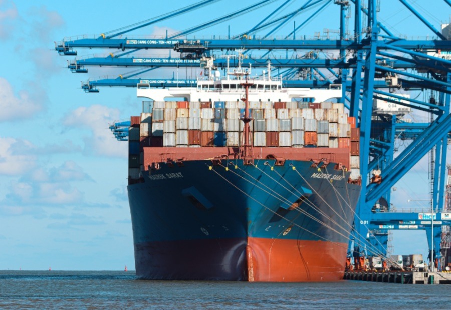 Large container ship in a harbour.