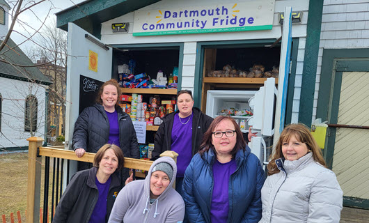 Members of the Eastlink Customer Care team drop off a food donation in Dartmouth, Nova Scotia.