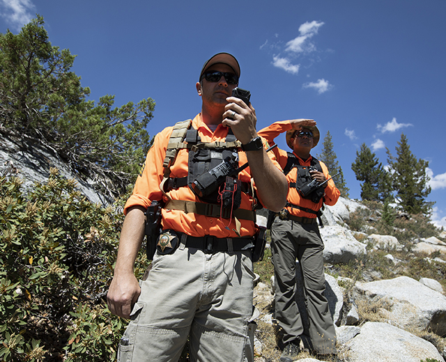 Two deputies with the Fresno Sheriff’s Department participate in a search and rescue exercise near Courtright Reservoir. The department recently adopted FirstNet and conducted this exercise using FirstNet devices and a FirstNet deployable. 