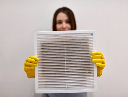 woman holding air vent