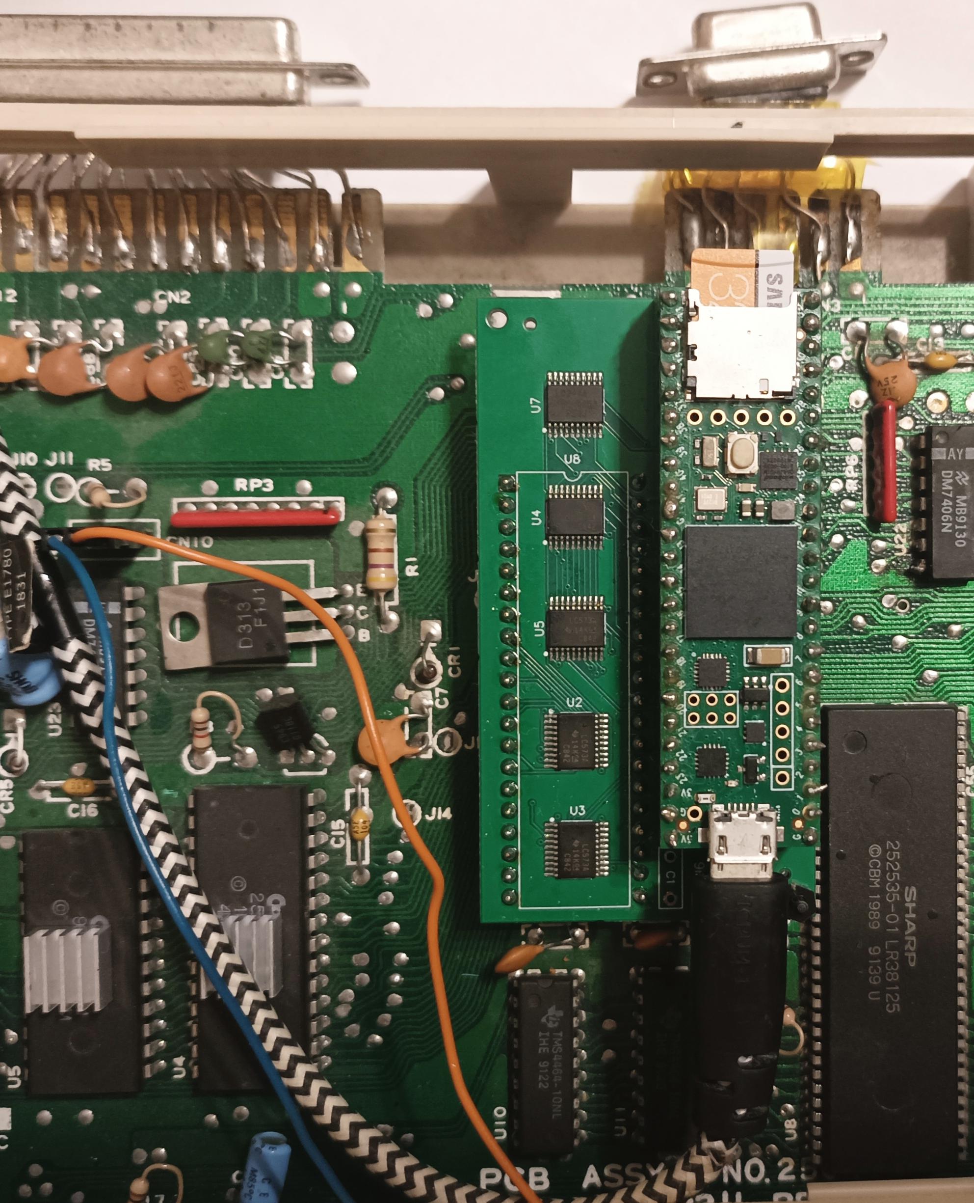 Teensy64 module installed in C64