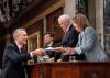 NATO Secretary General Jens Stoltenberg greets Nancy Pelosi and Mike Pence.