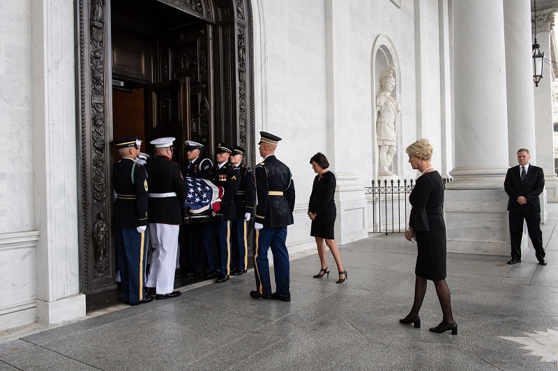 Senator McCain’s wife Cindy follows his casket  into the U.S. Capitol. Photo by Dana Barciniak.