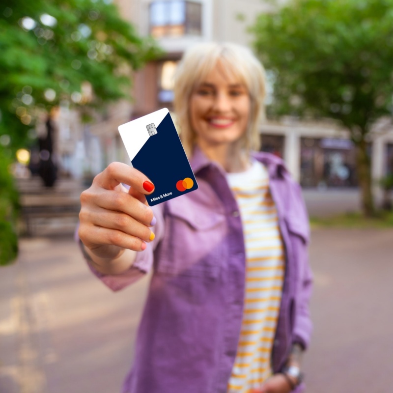 Woman showing MyFlex Credit Card