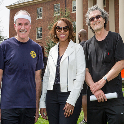 Dr. Eliseo J. Pérez-Stable, NIMHD Director (R), Rear Admiral Peter Kilmarx, Assistant Surgeon General and Deputy Director of the NIH John E. Fogarty Center (L), and Dr. Regina James, NIMHD Director of Clinical & Health Sciences Research (C)