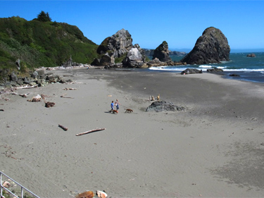 A view of people walking on the ocean beach