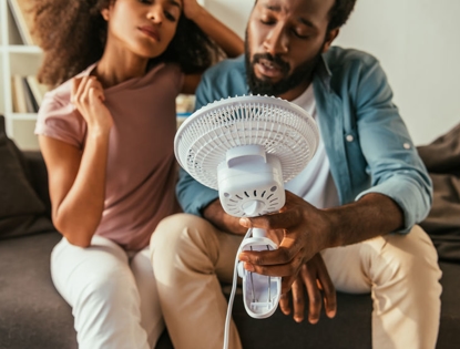 couple with fan