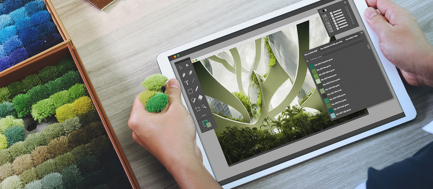 RAL digitale Farbbibliotheken | RAL FARBEN
Das Bild zeigt eine Architektursoftware auf einem Tablet, in der ein Bauwerk mit unterschiedlichen grünen RAL Farben eingefärbt wird. Hierbei kann man die verschiedenen Farbkacheln mit den Farbbezeichnungen sehen. Links daneben ist eine Sammlung mit verschiedenen Textilen Mustern zu sehen. Die Person, die das Tablet in der Hand hält, hält in einer Hand zusätzlich drei der textilen Muster in passenden Grün-Tönen.

RAL digital colour libraries | RAL COLOURS
The picture shows architectural software on a tablet in which a building is coloured with different green RAL colours. HYou can also see different colour tiles with the colour names. To the left you can see a collection of various textile patterns. The person holding the tablet also holds three of the textile patterns in matching shades of green in one hand.