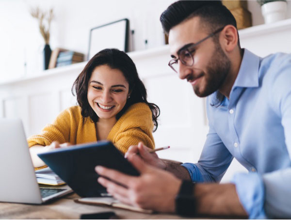 Couple using devices