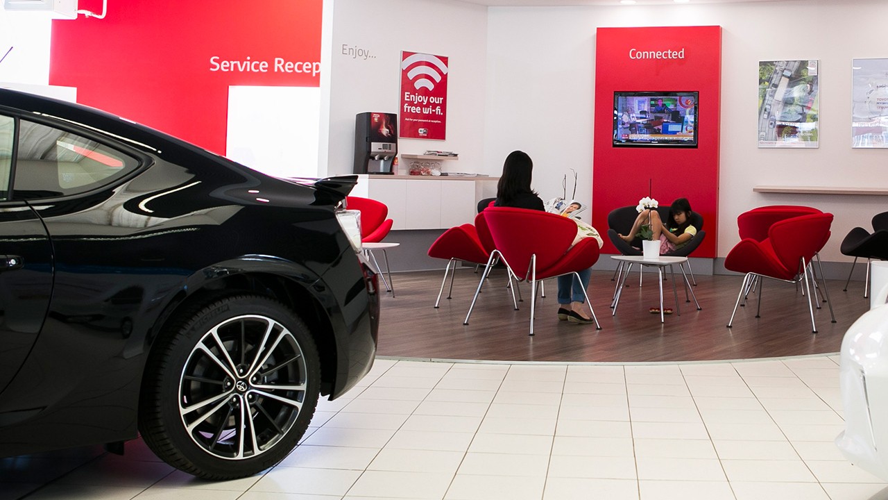 Customer in Toyota showroom