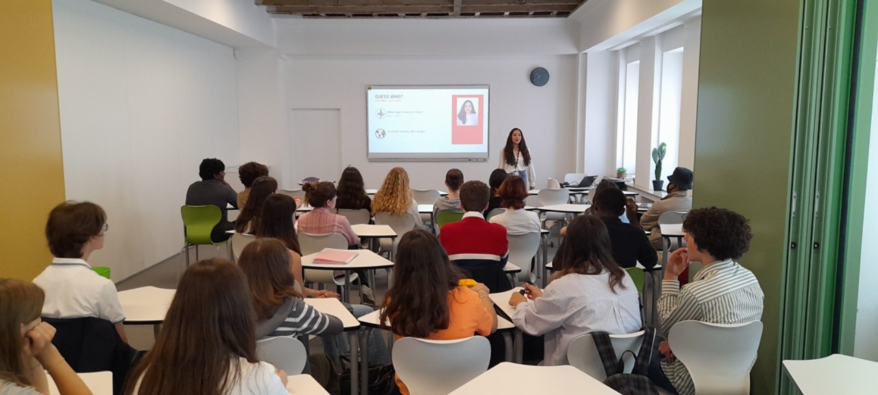 Andrea Lazcano in front of the classroom