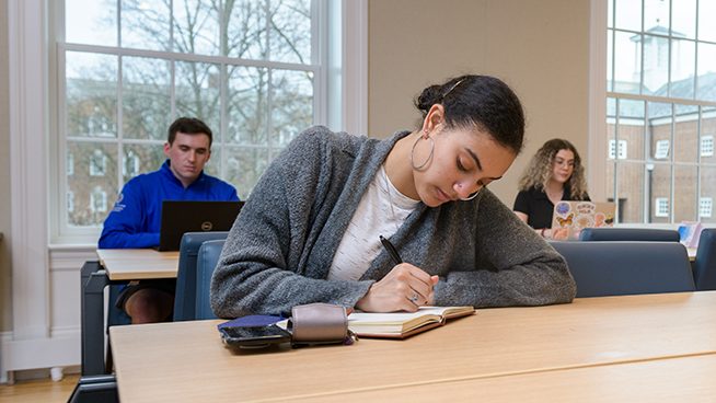 A female student writing