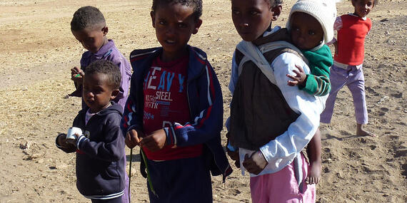 Children in a desert landscape