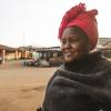 A woman stands for a portrait at the market in Tala, Kenya.