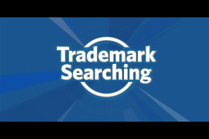 White Trademark Searching letters on a blue background