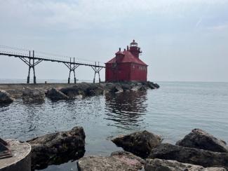 Photo of a red, square lighthouse